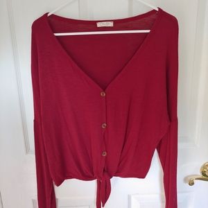Maroon long sleeve size medium.